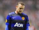 Rooney return from knee injury delayed