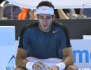 Aus Open Pix: Del Potro out; Federer breaks Aus hearts