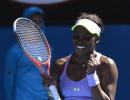 PHOTOS: Stephens stuns ailing Serena, Federer forges on