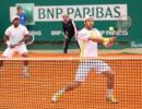 Paes-Melzer crash out of French Open