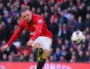 Wenger admits interest in signing Rooney, Fabregas