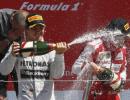 Rosberg triumphs in Britain after Vettel retires