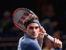 Federer advances in Paris; books 12th Tour Finals spot