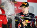 Formula One: Vettel cruises to Singapore treble