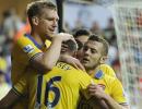 EPL PHOTOS: Slick Arsenal win to stay top; United, City lose