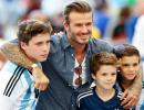 Soccer star Beckham and son 'shaken' after car crash