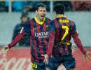 Messi lifts Barcelona back to the top of La Liga