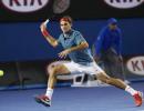 Vintage Federer routs Tsonga to book Murray quarter-final