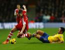 EPL PHOTOS: Arsenal drop points; Reds hammer Everton in derby