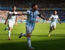 PHOTOS: Messi magic sends Argentina through to last 16