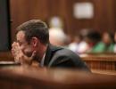 Pistorius vomits in court at Steenkamp autopsy details