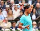 French Open Photos: Nadal gains momentum, Ferrer eases through