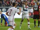 Mueller hat-trick sends Bayern seven points clear at the top