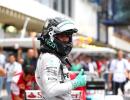 Rosberg beats Hamilton to pole in Brazil