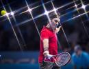 ATP Tour Finals PHOTOS: Federer made to grind it out by Raonic