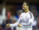 Ronaldo grabs double as Messi breaks goal record