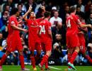 EPL PHOTOS: 'Lucky' Liverpool strike late to down QPR on dramatic weekend