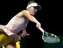 Wozniacki outlasts erratic Sharapova in WTA Finals