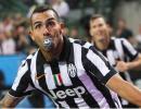 Tevez strikes as Juve beat toothless Milan