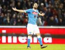 Higuain takes refined Napoli top of Serie A table