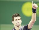 Djokovic eases past compatriot in Doha