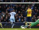 Cazorla shines as Arsenal hit Man City's title bid