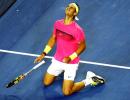 Nadal survives cramps to battle into third round