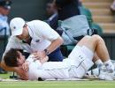 Wimbledon: Massaged Murray bites back to reach last 16