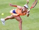 Kerber claims first grasscourt title