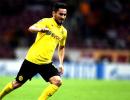 Borussia Dortmund's Guendogan now considering to stay on