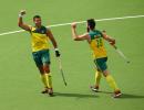 Australia thrash India to top Pool A