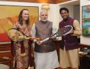 Paes, Hingis present PM Modi with autographed racquets