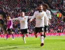 Mata strikes twice as United down 10-man Liverpool