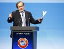 Platini re-elected as Blatter sits through criticism