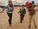 Soccer eases life in Jordan refugee camp, until goal dispute!