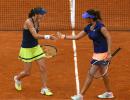 Saina, Paes, Bopanna advance in doubles at French Open