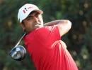 Lahiri stays afloat with late birdies in Dubai