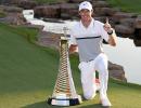 McIlroy wins DP World Tour Championship, tops money list again