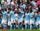 Man City flex muscles as English clubs break spending record