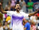 US Open PHOTOS: Cilic, Vinci fight their way into semis