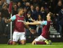 EPL PHOTOS: Hammer Payet's double sees Newcastle slide to bottom