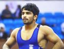 Grappler Sandeep Tomar wins bronze, secures Olympic berth