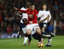 EPL PHOTOS: Man United sink Spurs; Chelsea go top