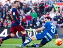 La Liga: Messi treble lifts Barca to the top of table