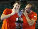 Big brother Murray sets the tone by clinching doubles crown