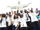 First-ever refugee team ascends to Rio's Christ statue