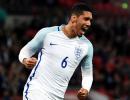 PHOTOS: Smalling smiling after England sink Portugal