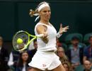 PHOTOS: Kuznetsova dumps out Wozniacki, Serena and Murray advance