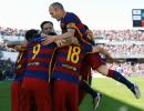 PHOTOS: Suarez 'tricks' Barcelona to La Liga title