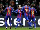 PHOTOS: Messi double lifts Barcelona, Man City advance